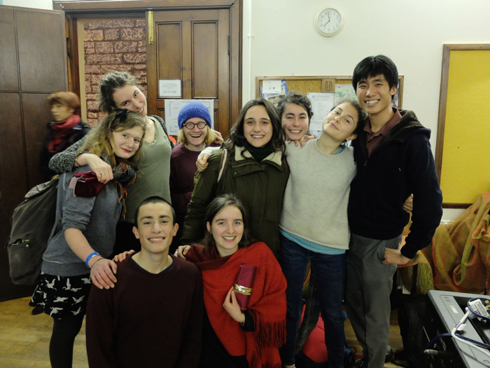 Benjamin (far right) with Transition’s student volunteers at last year’s Christmas party