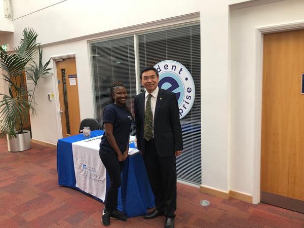 Yasmine and Professor Max Lu from the University of Surrey