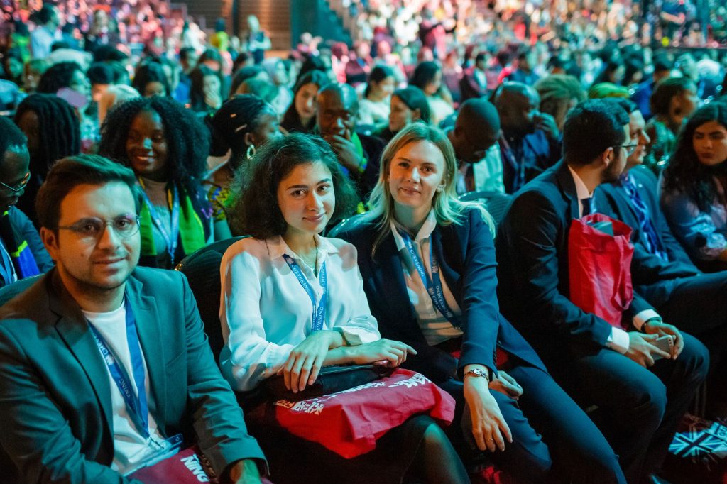 Scholars listen to presentations at Orientation