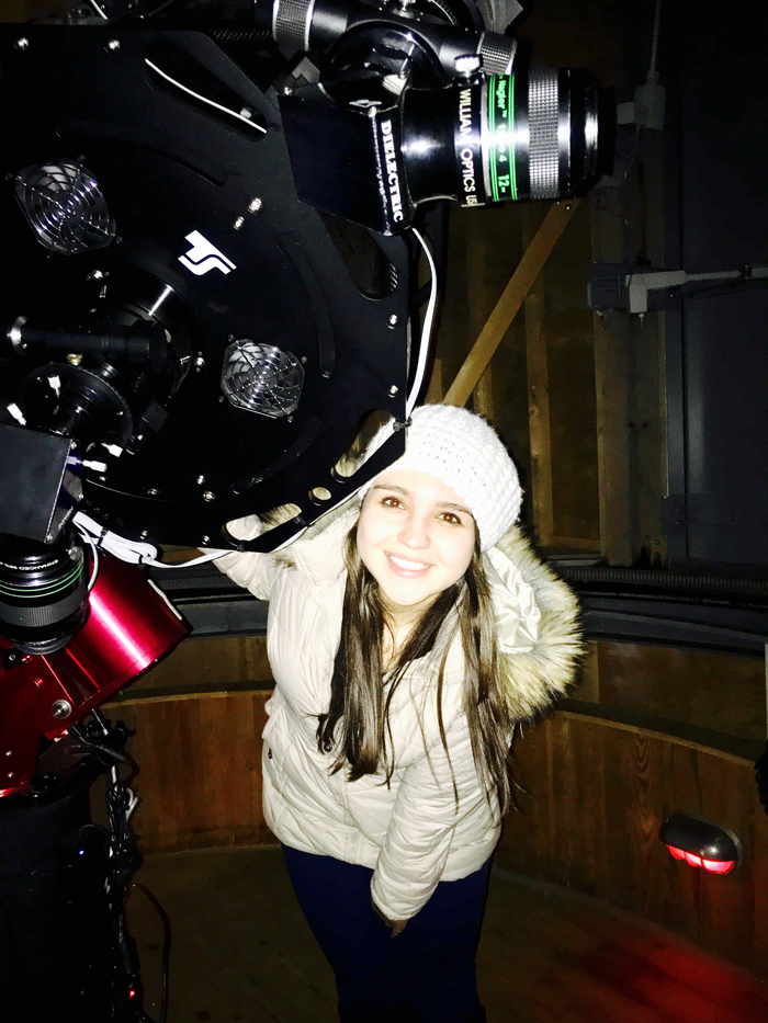 Camila Pantoja and a telescope