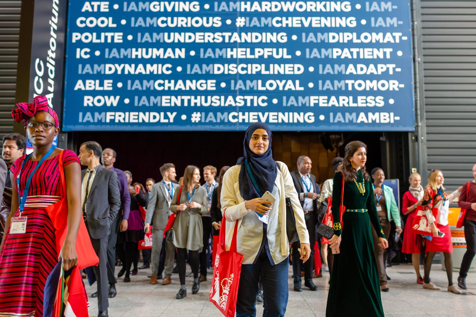 Girl in front of #IAmChevening banner