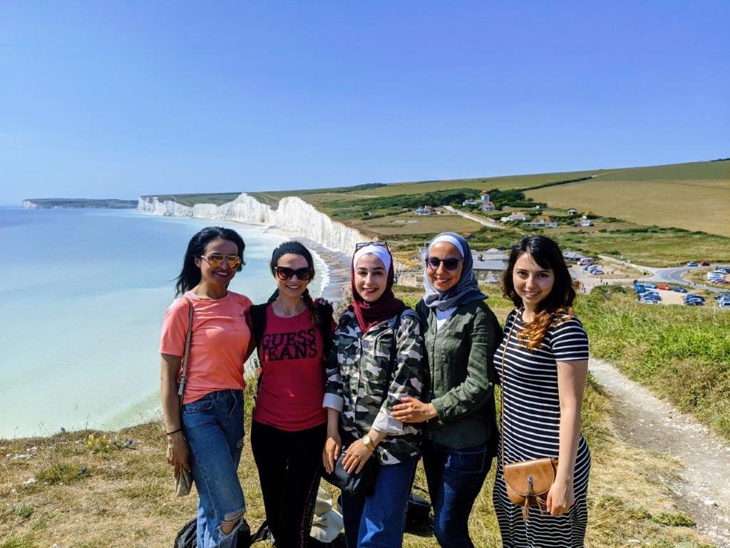 Leen Alhamwi and friends walk on the south coast of England