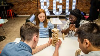 Group of RGU students playing Jenga