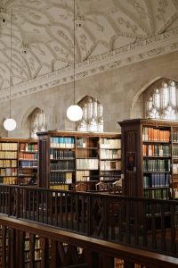 A library with full oak bookcases.