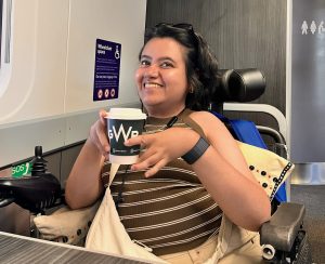 Kavya enjoying a ride in an accessible train