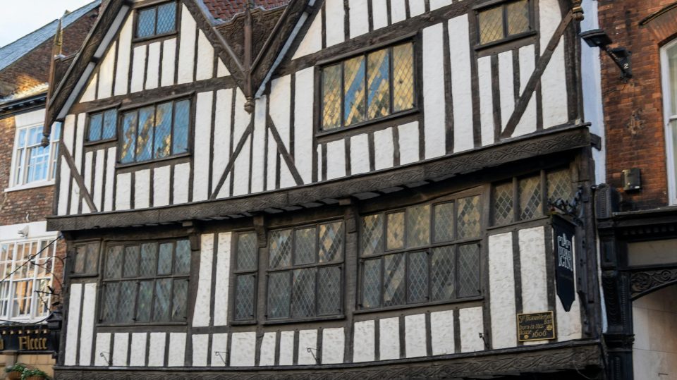 A Tudor house in an old English street